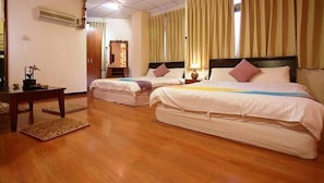 Premium bedding, desk, laptop workspace, soundproofing
