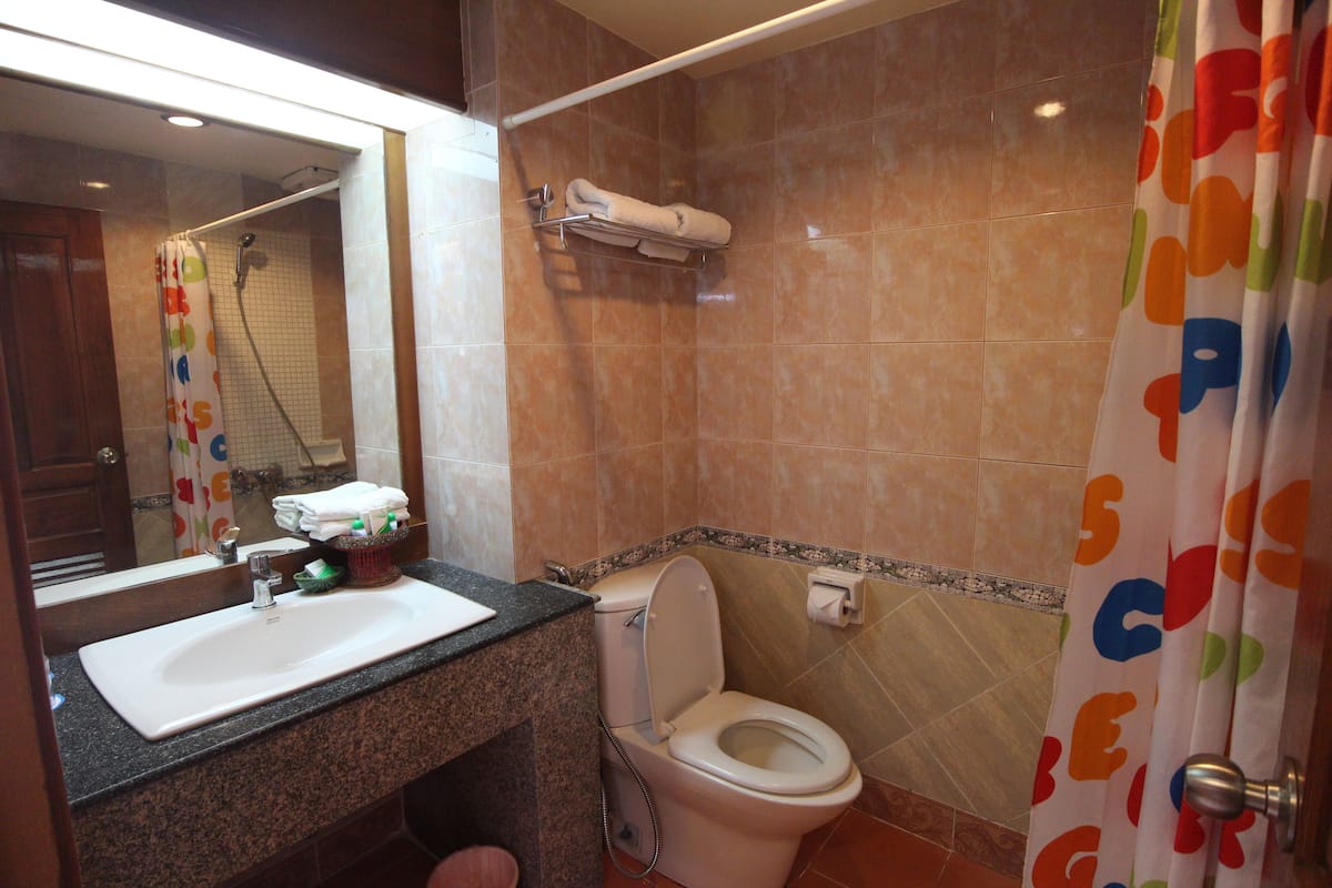 west wing double room | bathroom | shower, free toiletries, hair dryer, towels