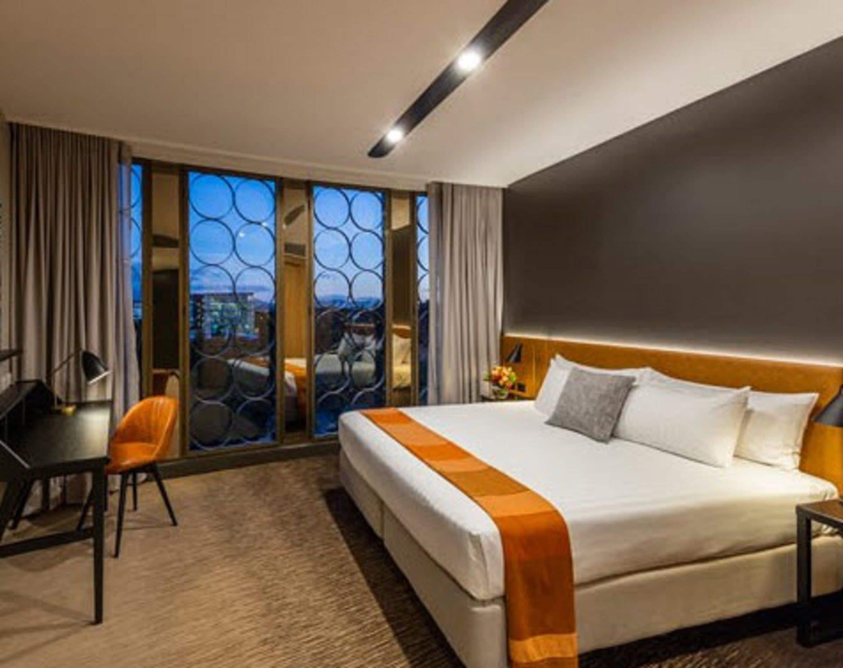 room, 1 king bed (first class) | premium bedding, pillow-top beds, minibar, in-room safe