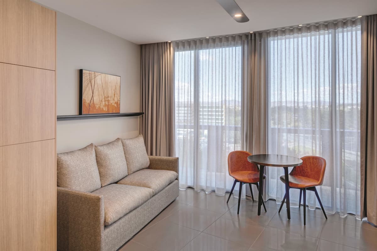 Premium bedding, pillow-top beds, minibar, in-room safe
