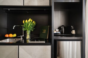 Deluxe Apartment | Private kitchen | Coffee/tea maker, electric kettle - Unica Suites Rome (Rome)