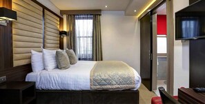 Luxe beddengoed, een kluis op de kamer, verduisterende gordijnen