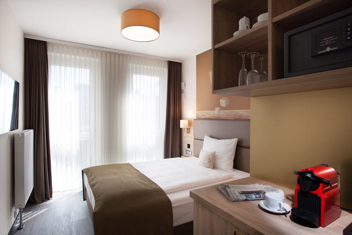 1 habitación, ropa de cama de alta calidad y minibar