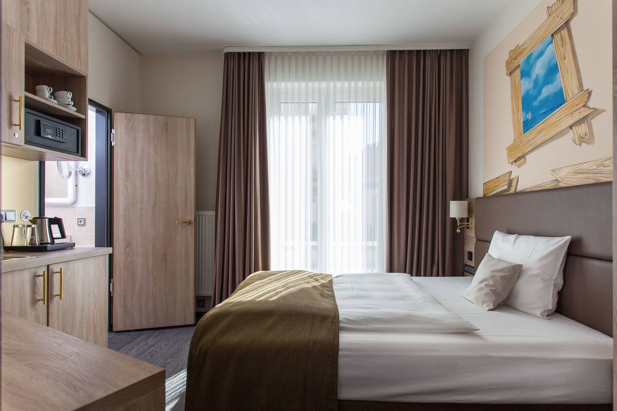 1 soverom, sengetøy av topp kvalitet, minibar og safe på rommet