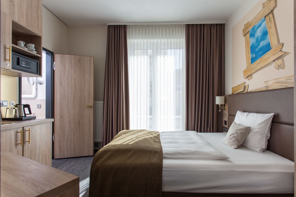 1 habitación, ropa de cama de alta calidad y minibar