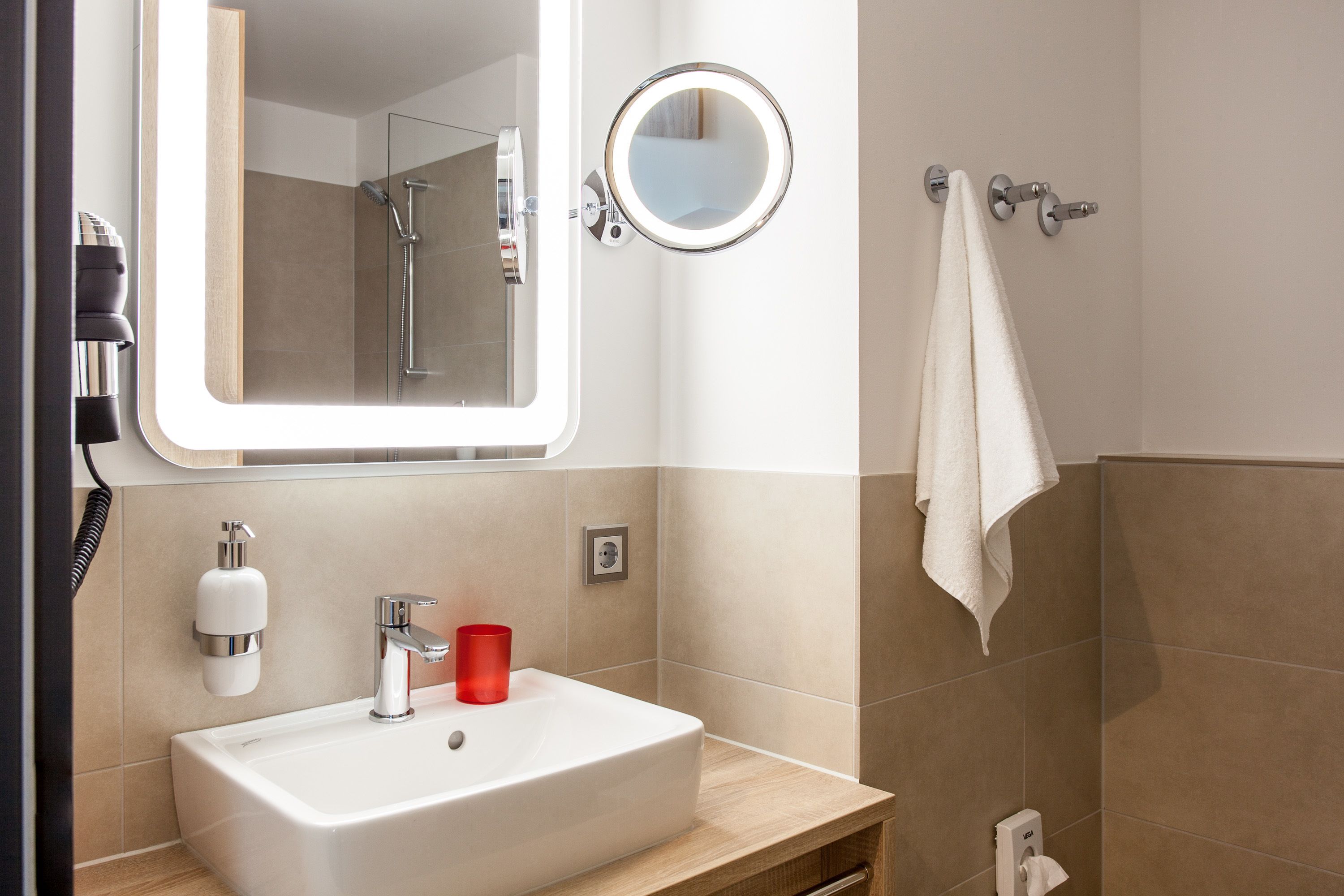 shower, free toiletries, hair dryer, towels