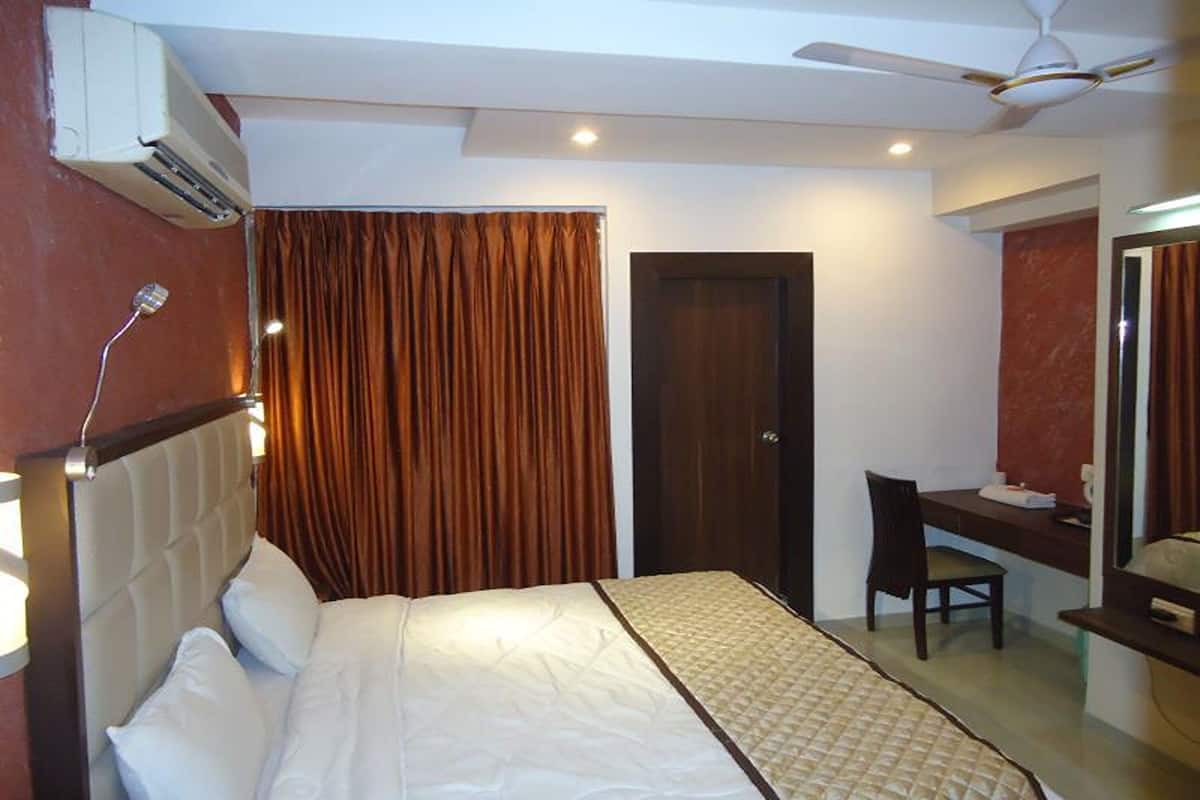 Egyptian cotton sheets, premium bedding, down duvets, memory-foam beds