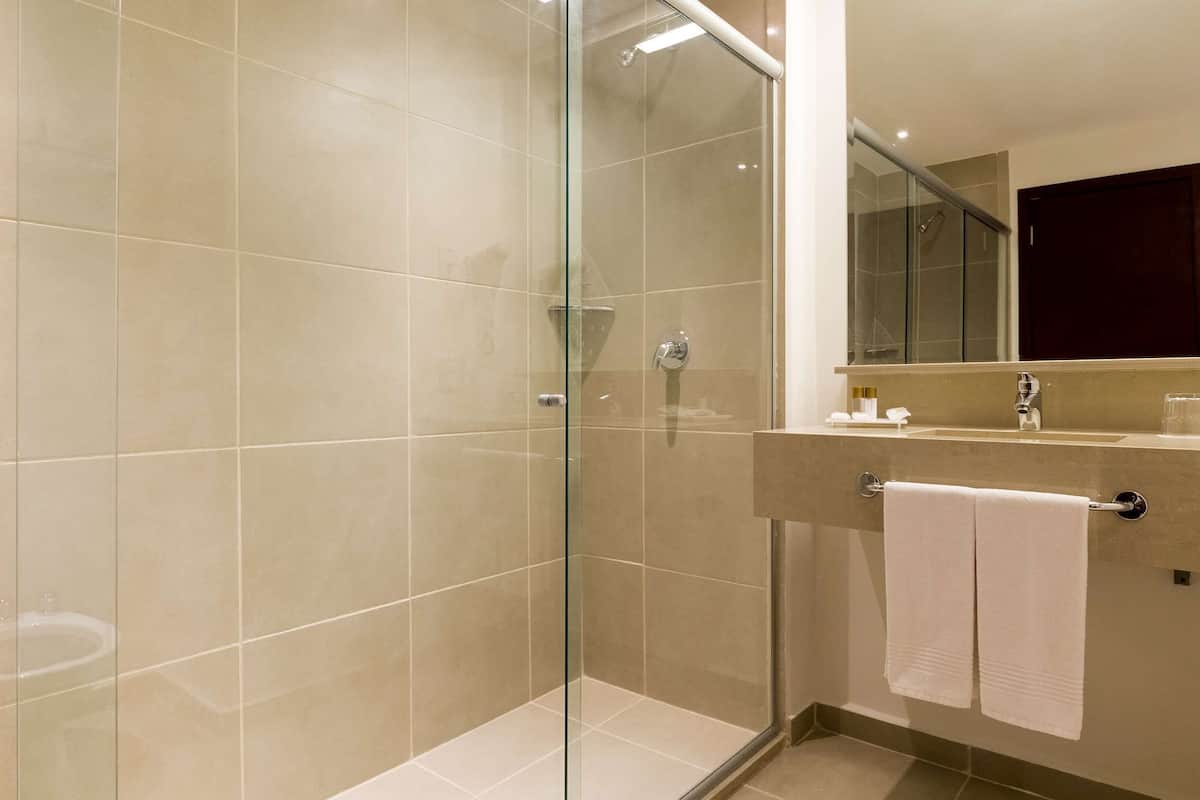 shower, eco-friendly toiletries, hair dryer, towels