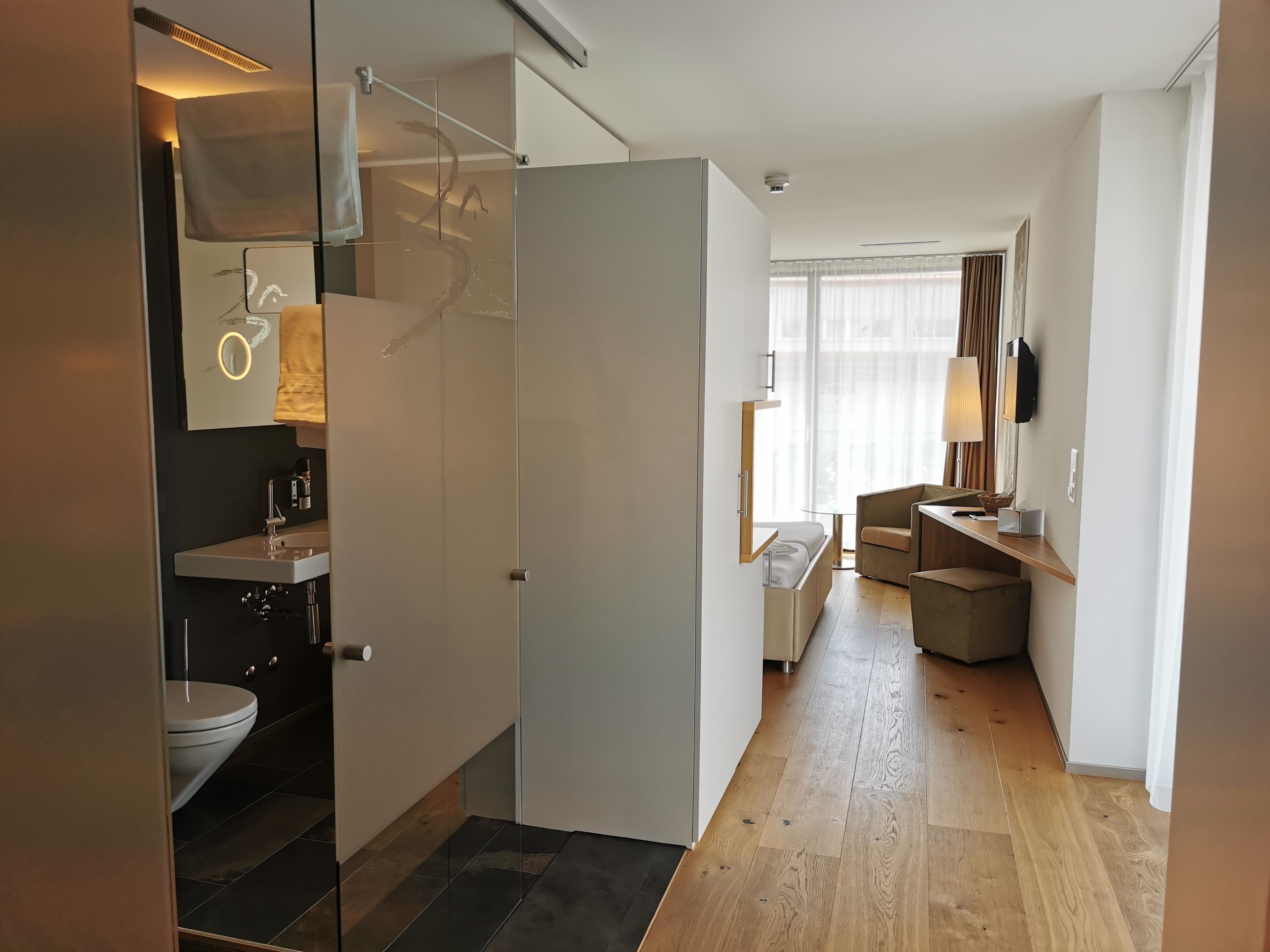 superior double room, corner | living area | flat-screen tv