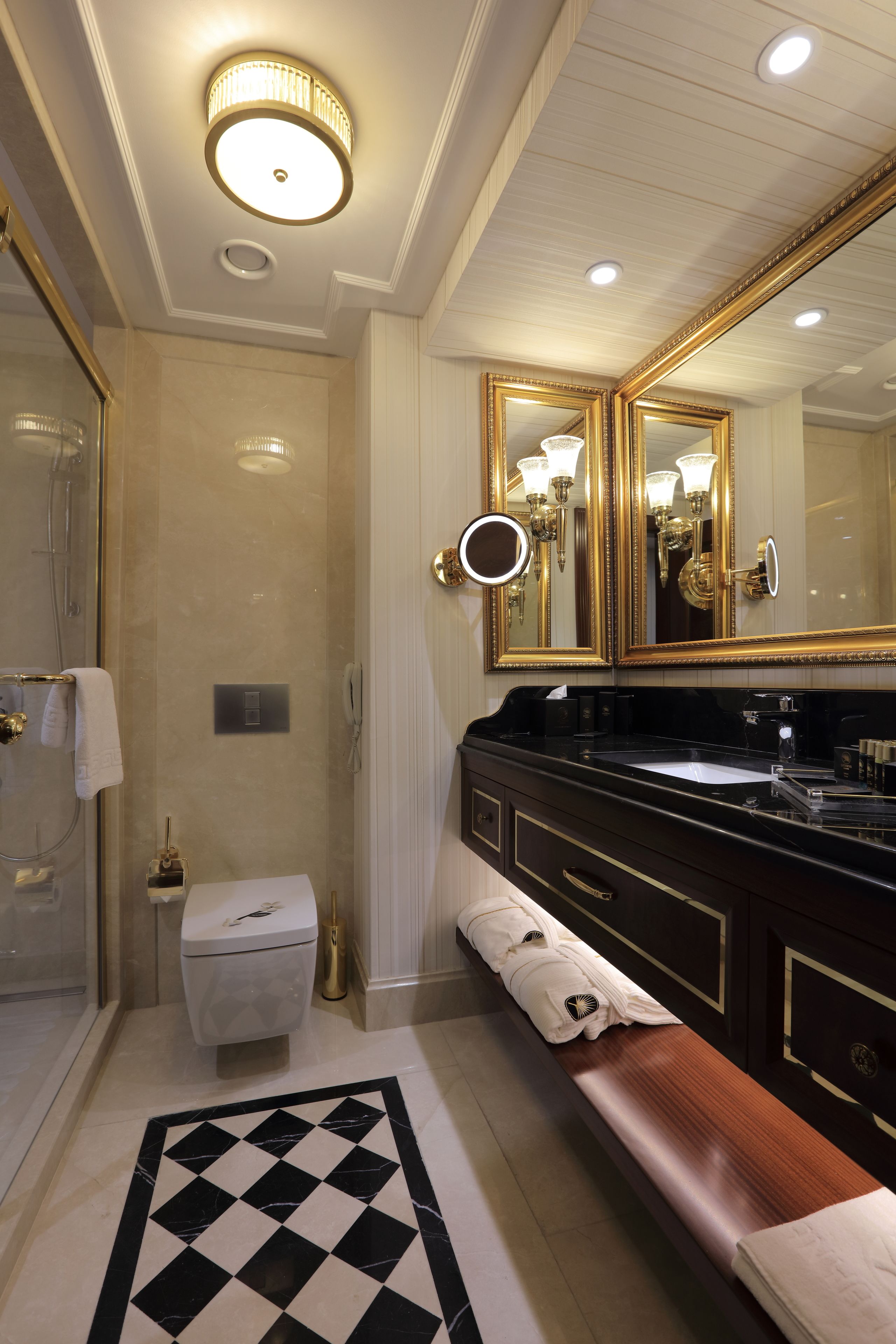 deluxe room | bathroom | shower, designer toiletries, hair dryer, bathrobes