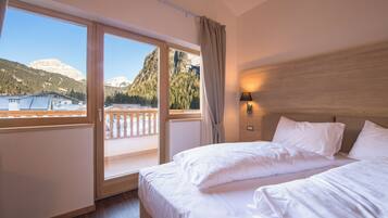 Premium bedding, down duvets, in-room safe, desk