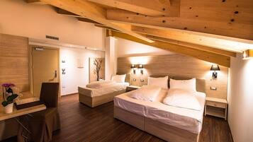 Premium bedding, down duvets, in-room safe, desk