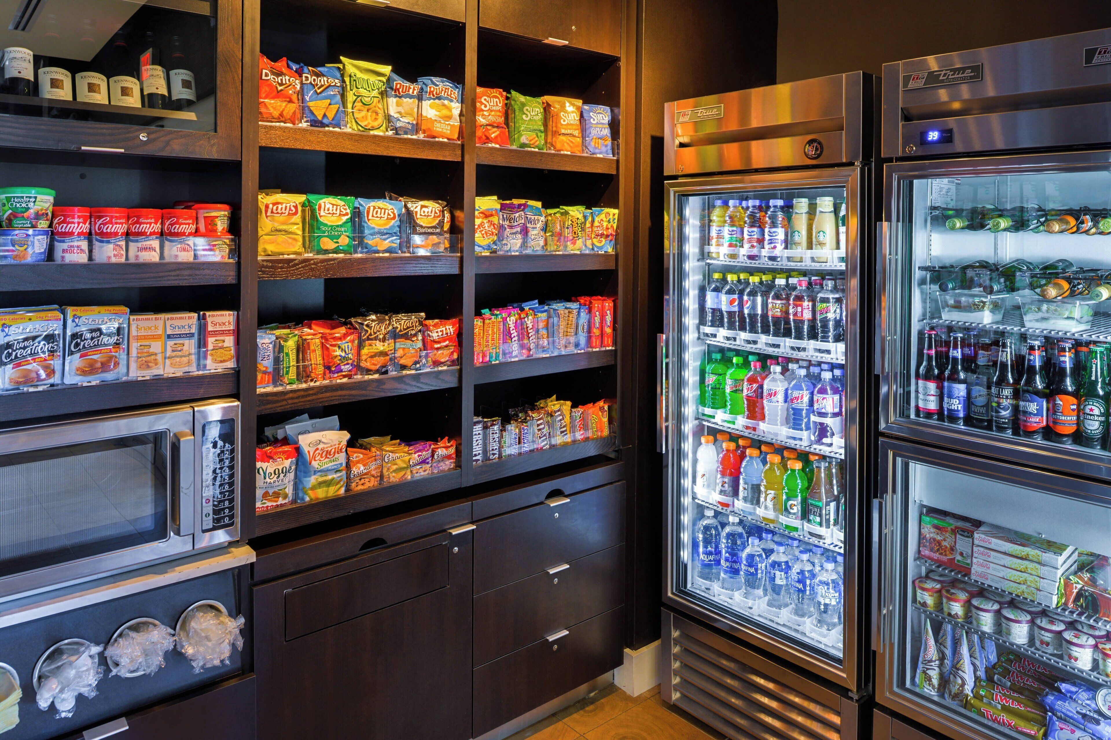 A vending machine area with snacks and beverages.