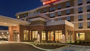 A Hilton Garden Inn with a brick facade, large windows, and a well-lit entrance. - Hilton Garden Inn Pittsburgh Airport South-Robinson Mall (Pittsburgh)