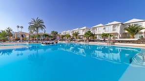 2 outdoor pools, open 10:00 AM to 6:00 PM, pool umbrellas, pool loungers