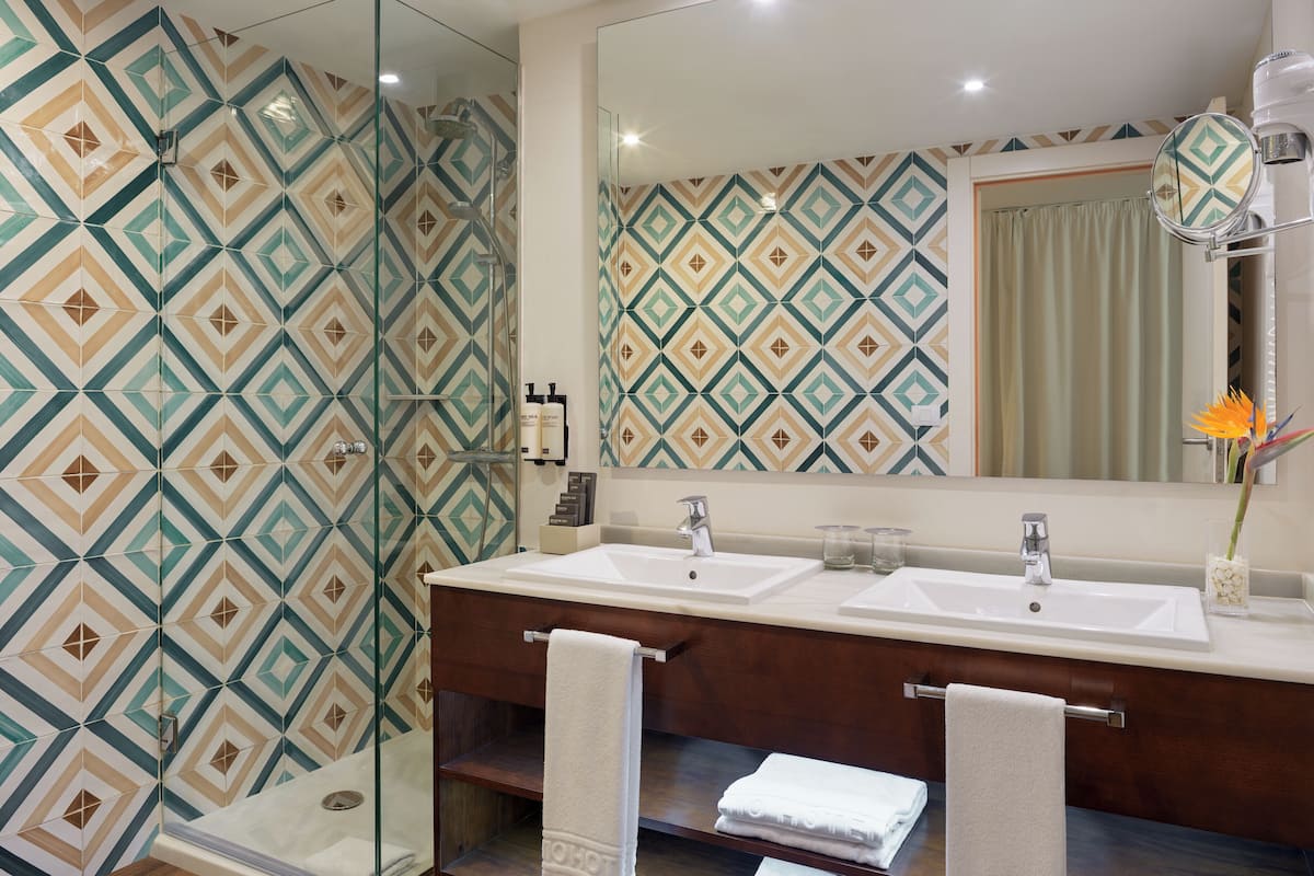 shower, rainfall showerhead, eco-friendly toiletries, hair dryer