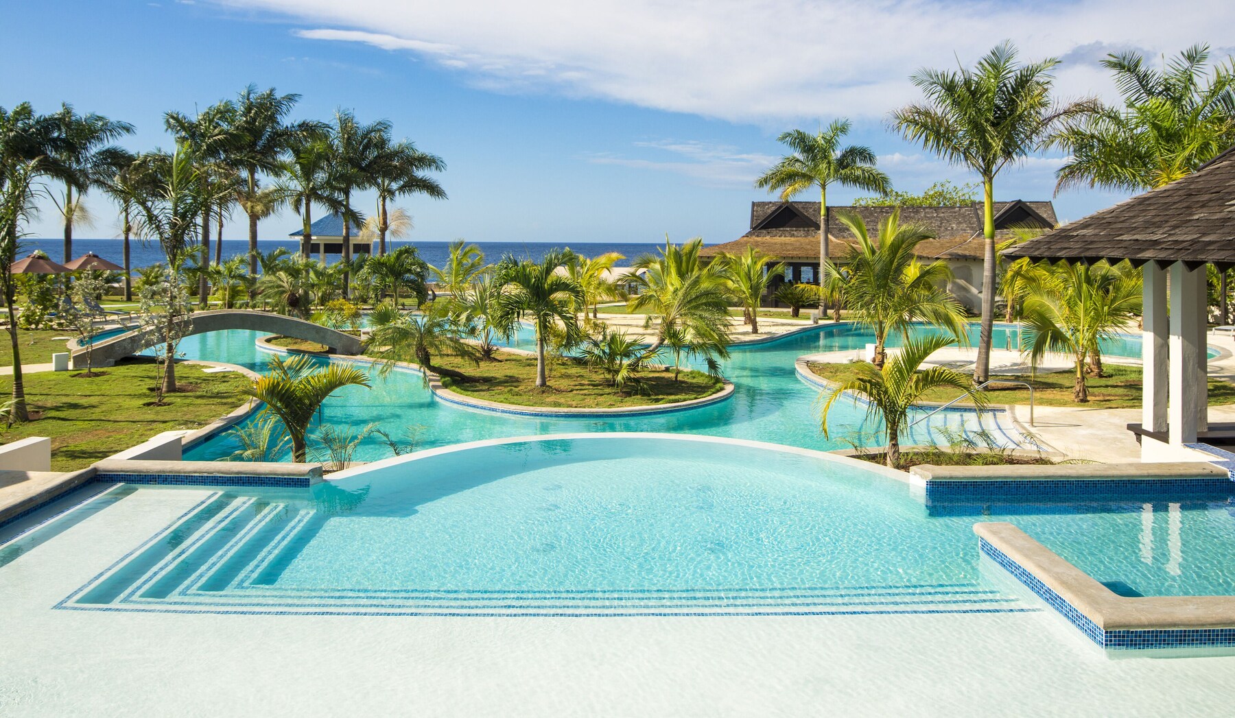 2 outdoor pools, pool umbrellas, sun loungers