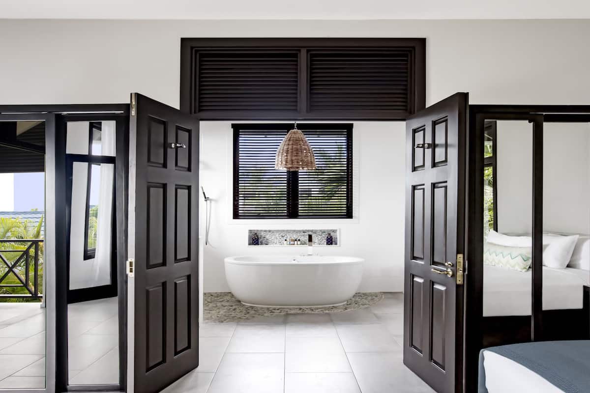 villa two | bathroom | free toiletries, hair dryer, bathrobes, slippers