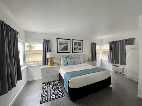 Tabla de planchar con plancha, wifi gratis y ropa de cama