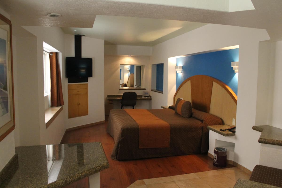 Desk, blackout drapes, iron/ironing board, free WiFi