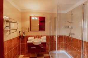 Shower, free toiletries, hair dryer, bathrobes