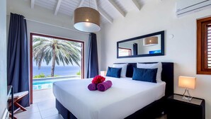 Deluxe Villa, 4 Bedrooms, Private Pool, Sea View | In-room safe, desk, laptop workspace, WiFi (free) - Coral Estate Rentals (St. Marie)