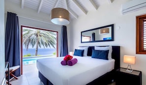 Deluxe Villa, 4 Bedrooms, Private Pool, Sea View | In-room safe, individually decorated, individually furnished, desk - Coral Estate Rentals (St. Marie)