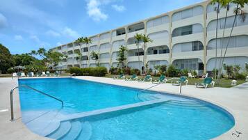 Outdoor pool, pool umbrellas, pool loungers