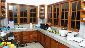 Villa, 3 Bedrooms | Private kitchen | Full-size fridge, microwave, stovetop, coffee/tea maker