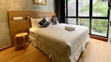 Deluxe Room With Windows | Premium bedding, memory-foam beds, individually decorated