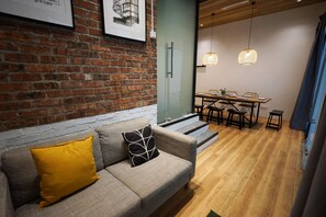 Deluxe Apartment, 3 Bedrooms | Living area | 24-inch flat-screen TV with cable channels, TV - CHAOS BOUTIQUE HOTEL (Kuala Lumpur)