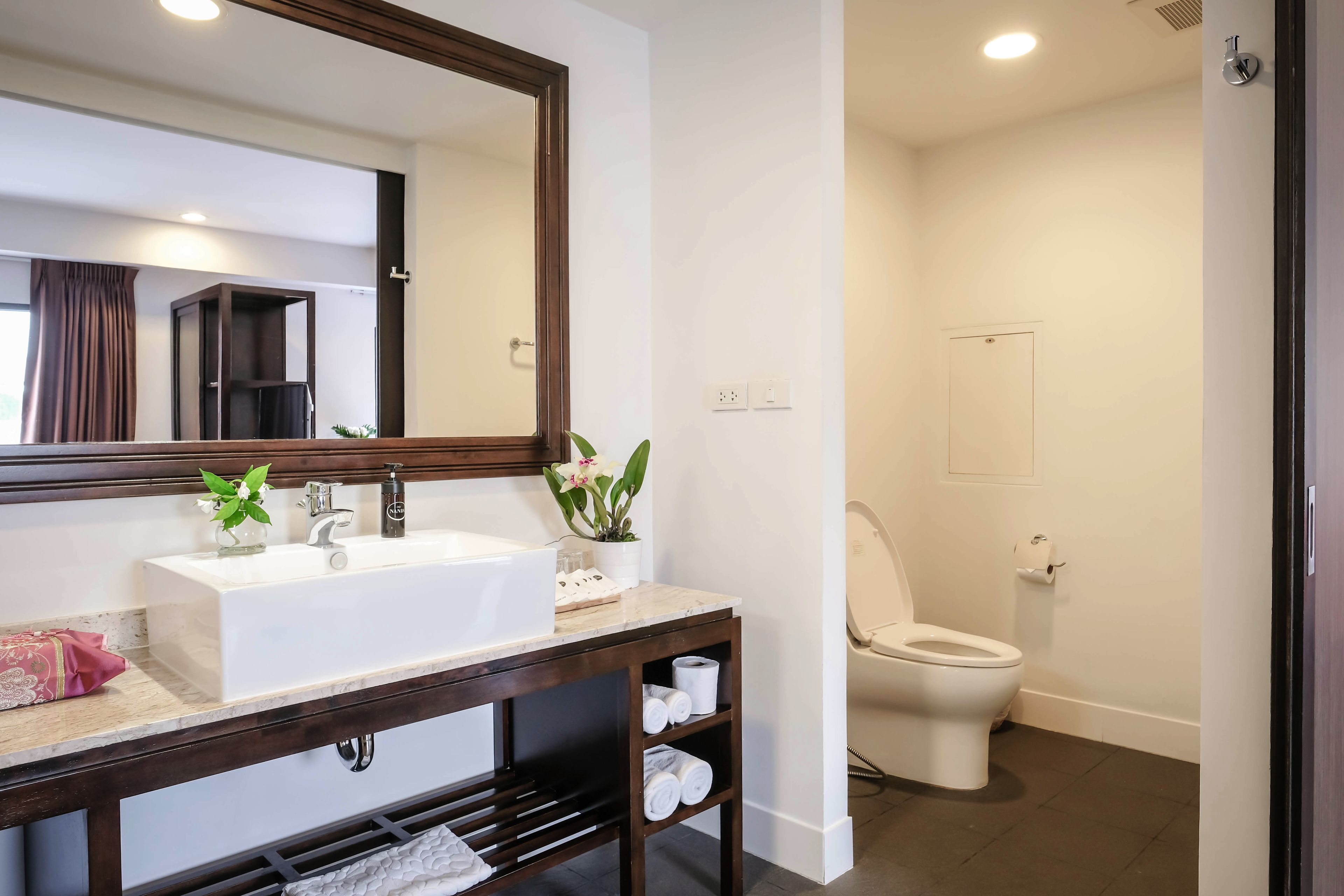 deluxe studio room | bathroom | shower, free toiletries, hair dryer, slippers