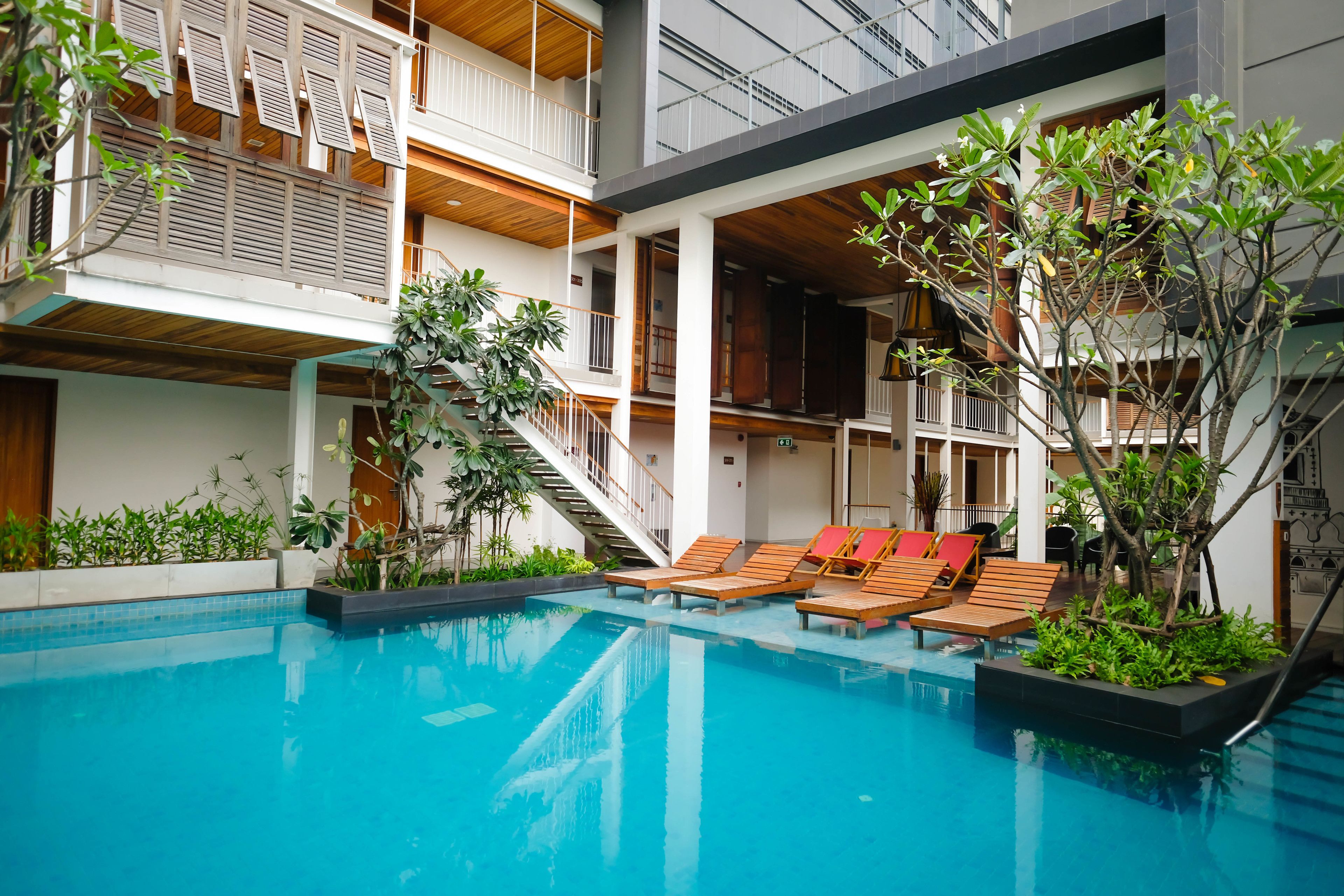 outdoor pool, pool loungers