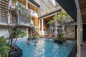 Outdoor pool, sun loungers