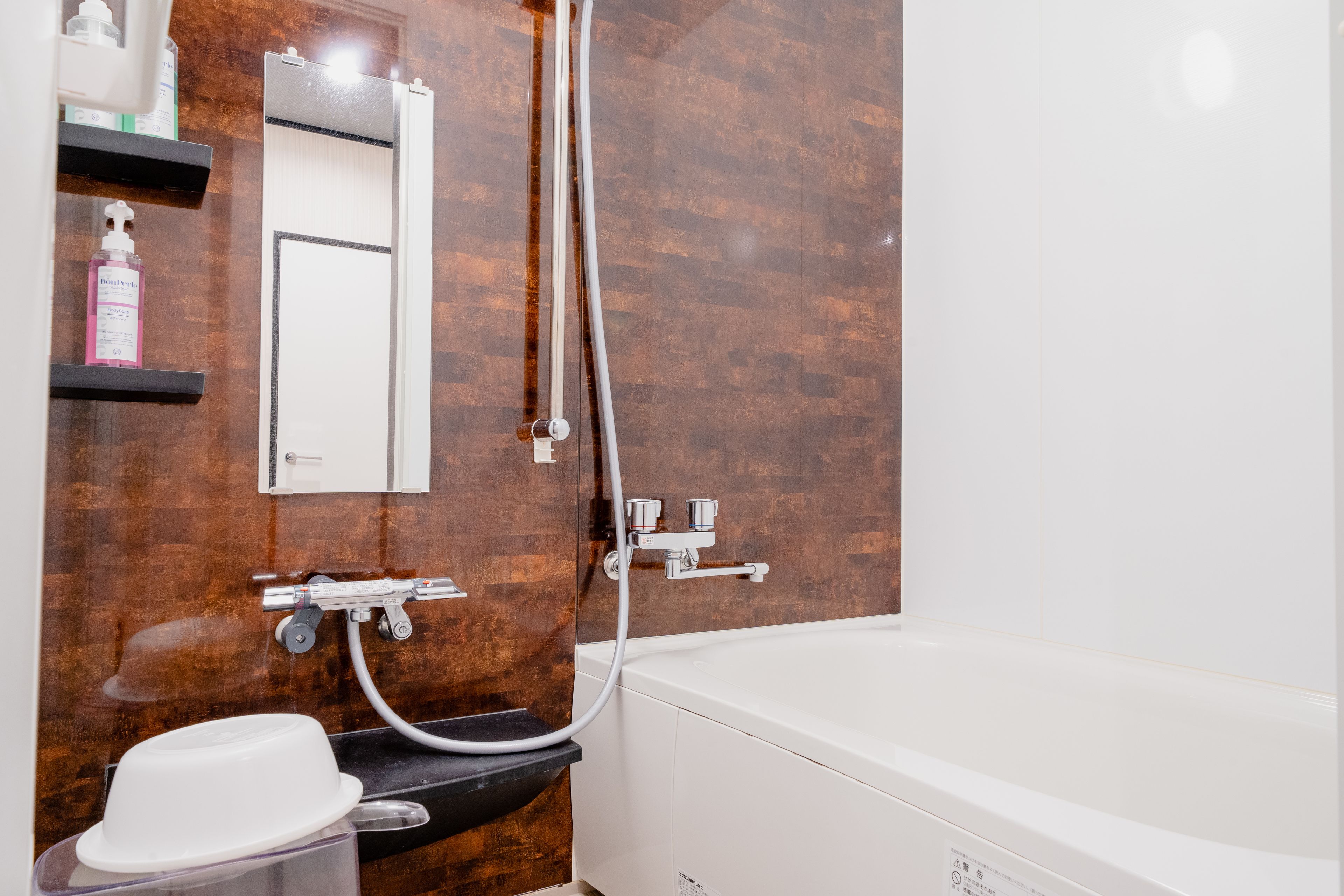 deluxe suite, 1 queen bed | bathroom | free toiletries, hair dryer, electronic bidet, towels