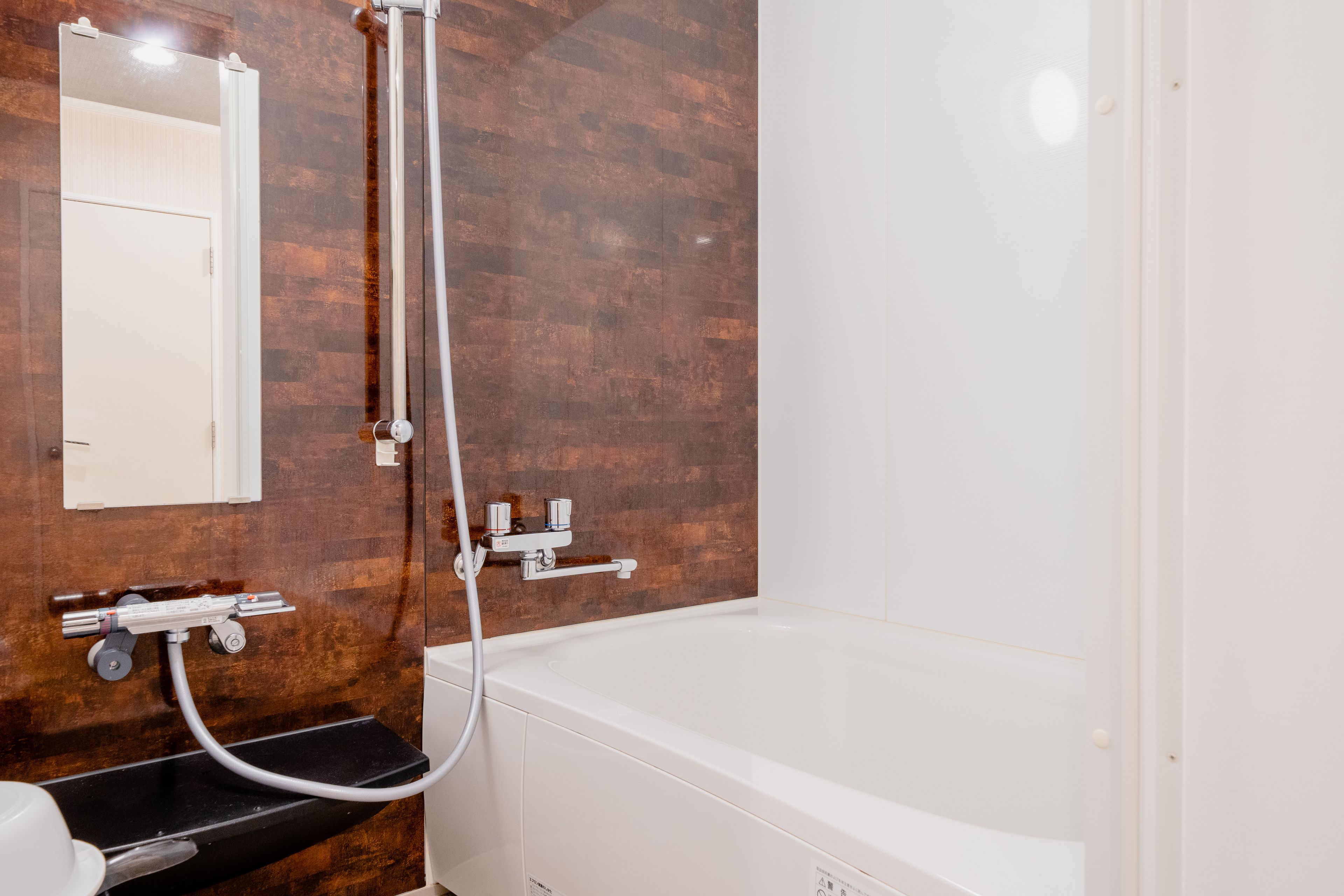 deluxe suite, 2 bedrooms | bathroom | free toiletries, hair dryer, electronic bidet, towels