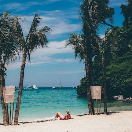 On the beach, sun loungers, beach umbrellas, beach towels