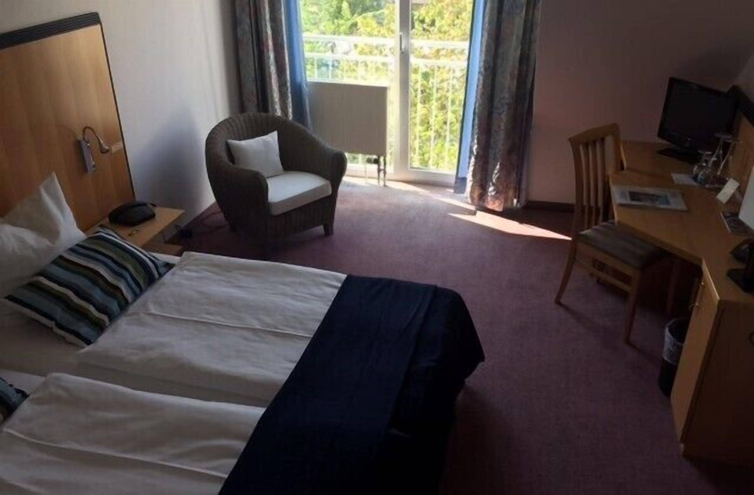 premium bedding, minibar, desk, laptop workspace