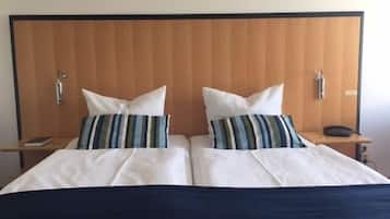 Ropa de cama de alta calidad, minibar y escritorio