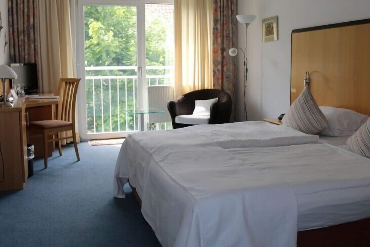 premium bedding, minibar, desk, laptop workspace