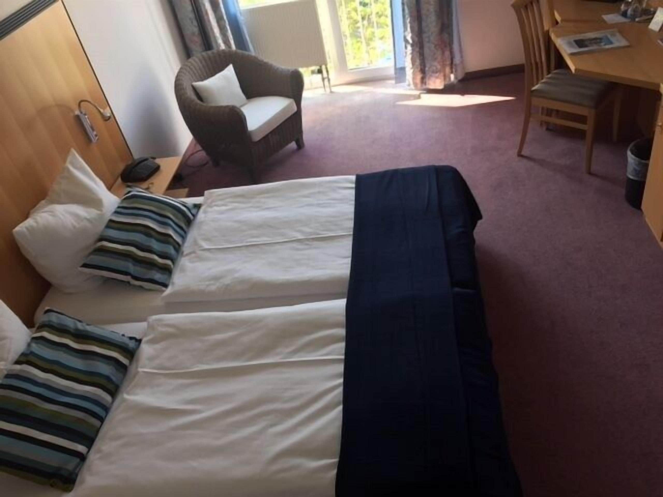 premium bedding, minibar, desk, laptop workspace