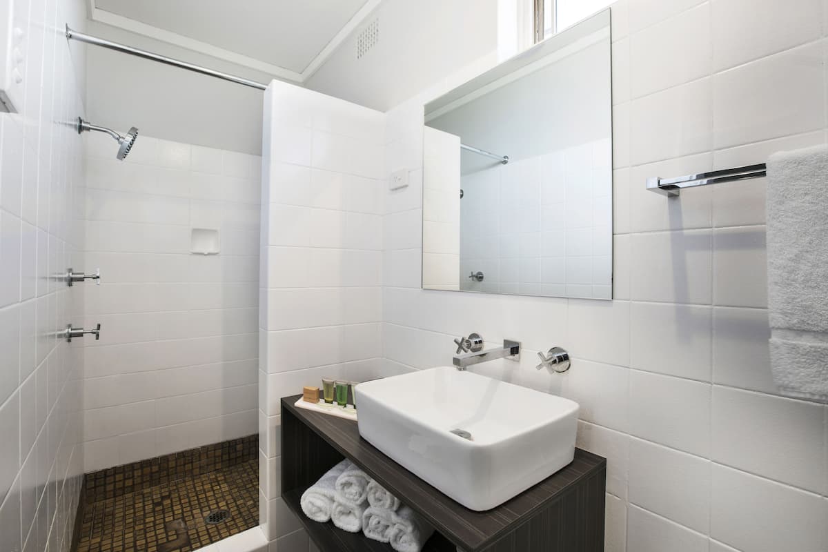 studio family | bathroom | shower, rainfall showerhead, free toiletries, towels