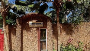 A stone building with a sign reading "SERMAKO RESIDENCE." - Sermaho Residence - Adults Only (Serrekunda)