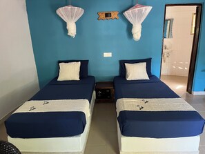 Signature Twin Room, 2 Twin Beds, Pool View | In-room safe, free WiFi, bed sheets, wheelchair access - Footsteps Eco-Lodge (Gunjur)