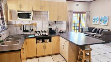 Large Family Cottage (3) | Private kitchen | Microwave, coffee/tea maker, electric kettle