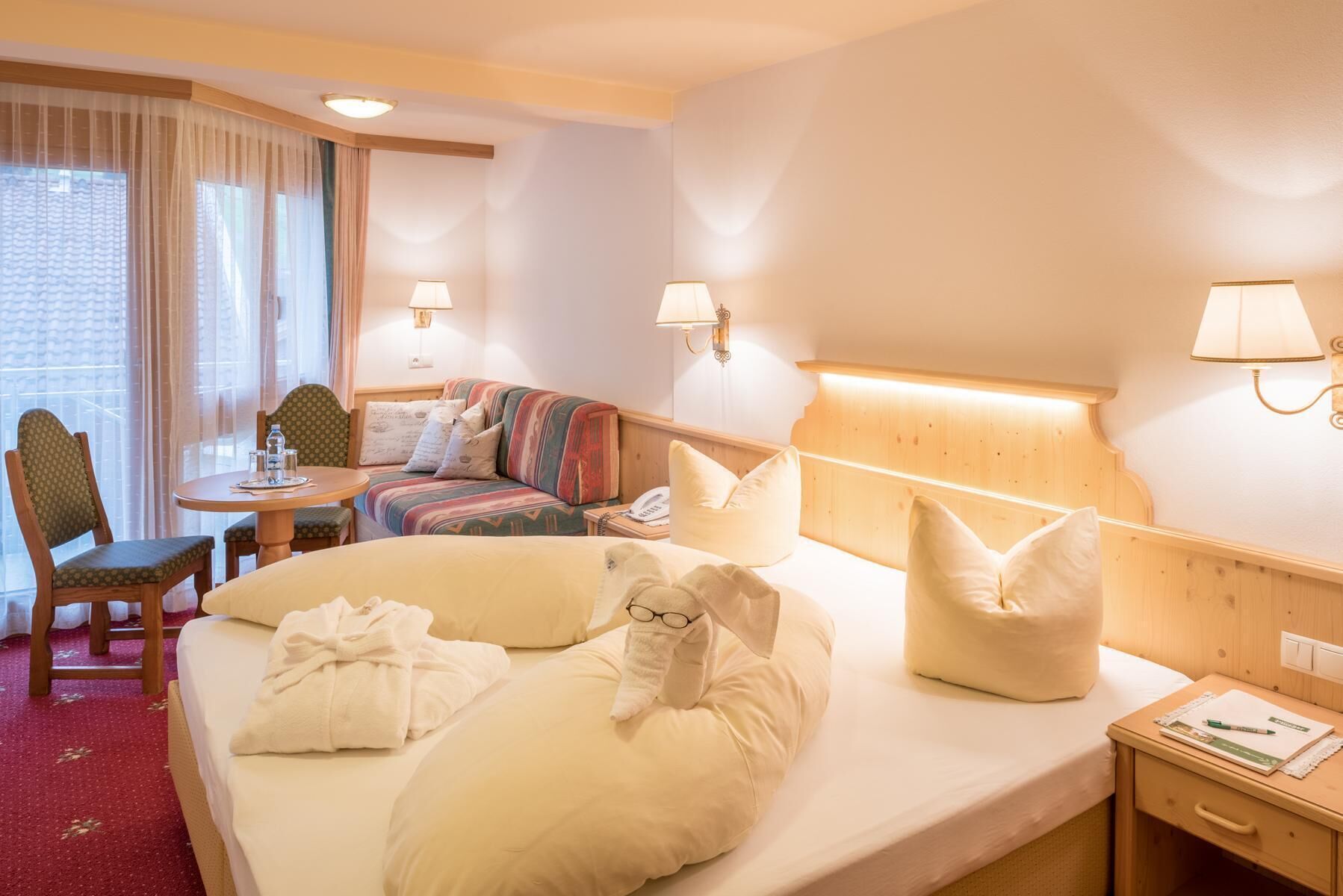 standard double room, balcony, mountain view | living area | 40-inch flat-screen tv with satellite channels, tv, table football