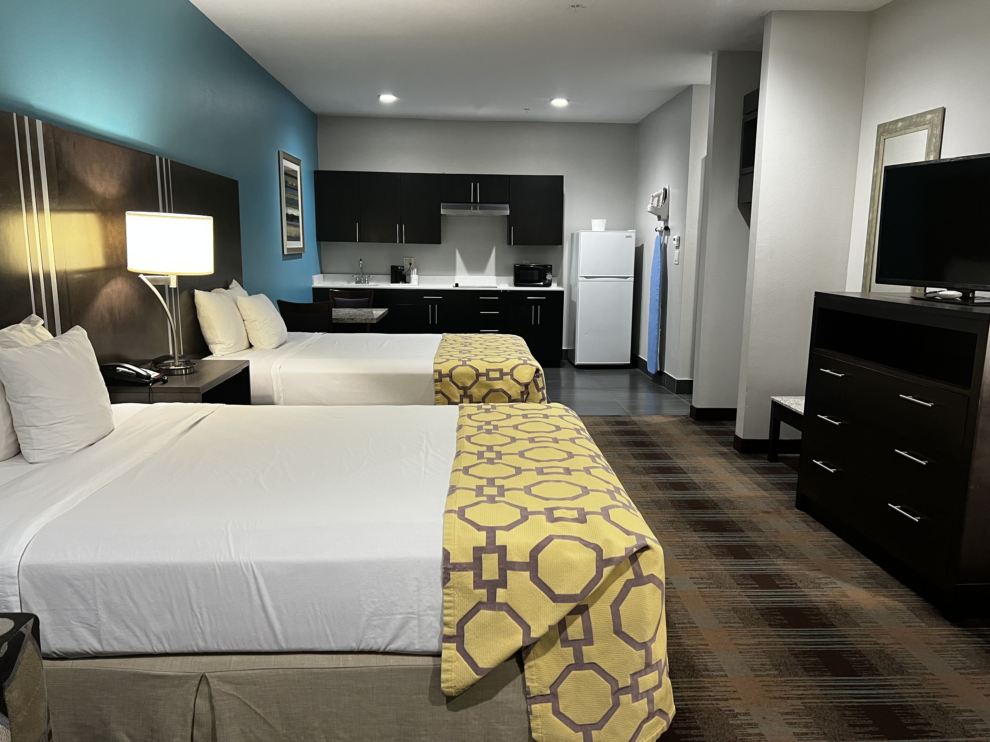 suite, 2 queen beds, non smoking, kitchenette | premium bedding, pillow-top beds, desk, blackout curtains