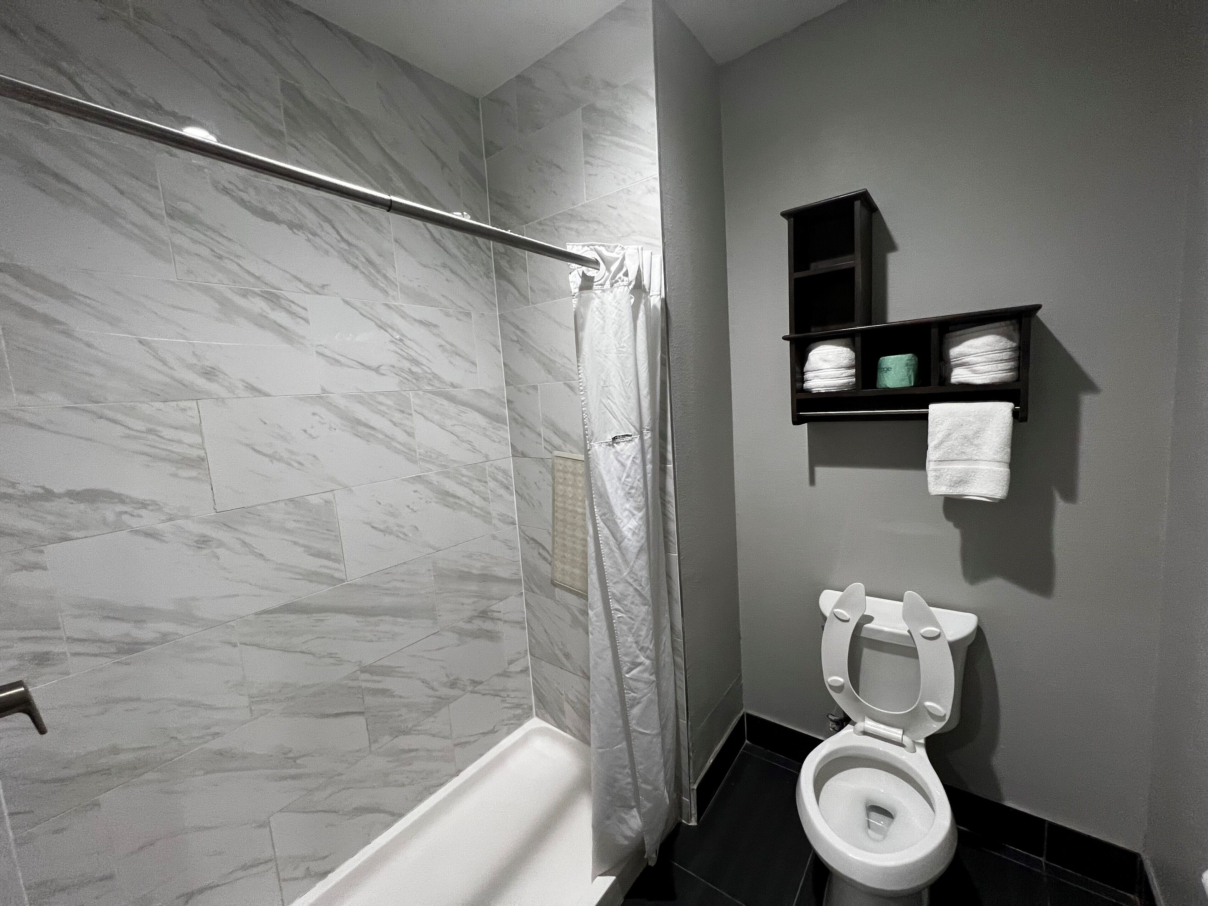 bathtub, rainfall showerhead, free toiletries, hair dryer