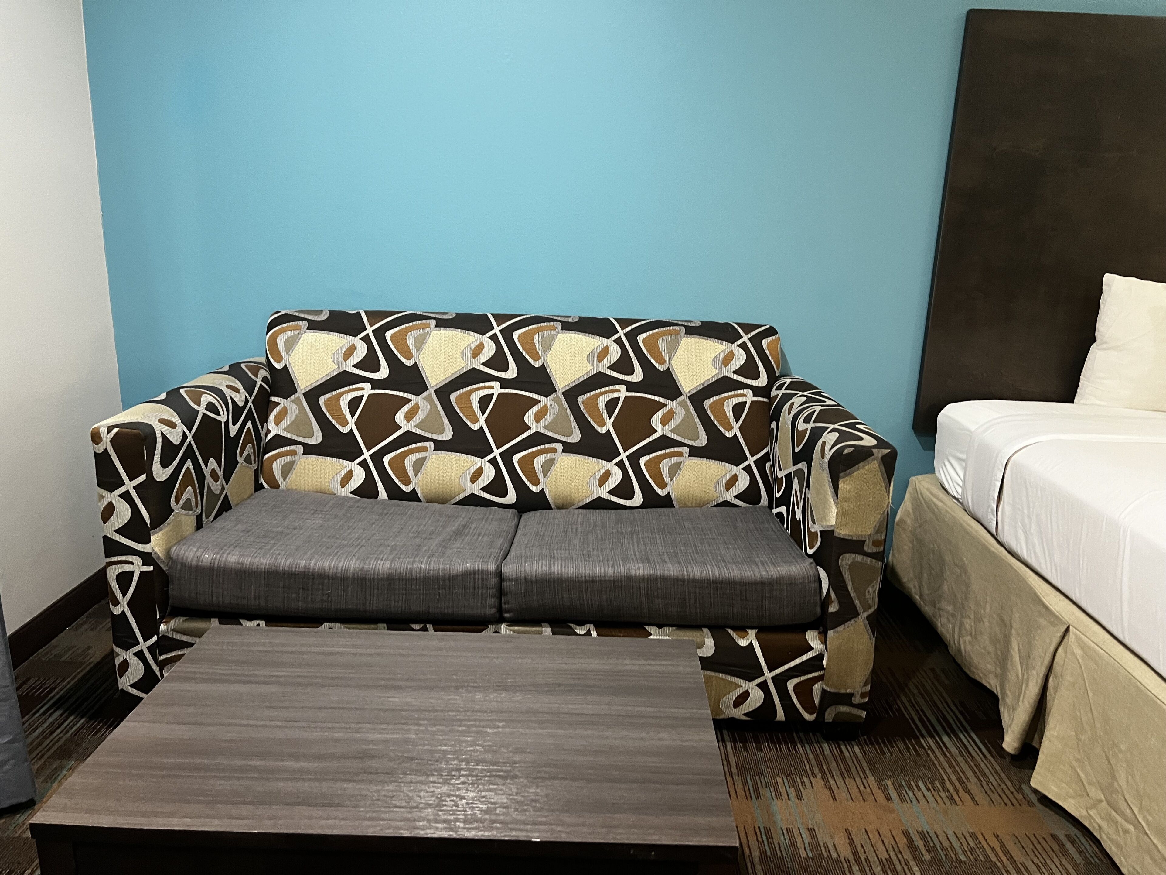 premium bedding, pillow-top beds, desk, blackout curtains