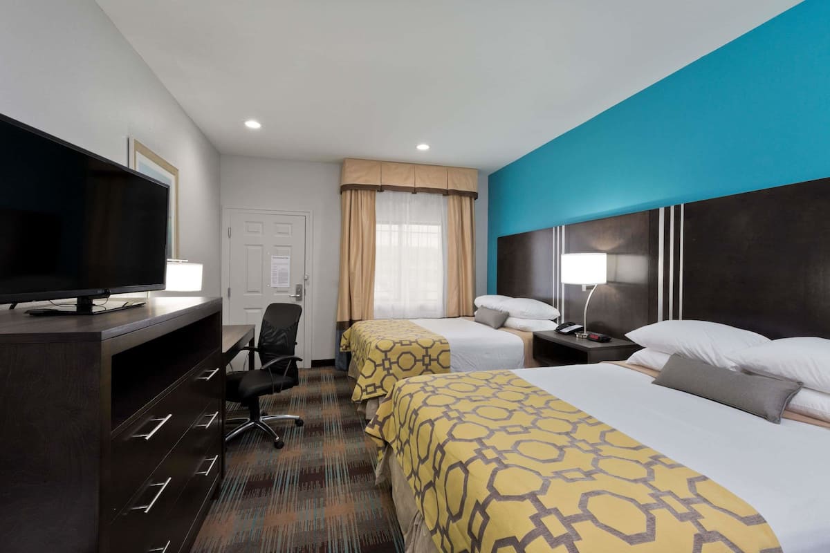 Premium bedding, pillowtop beds, desk, blackout drapes